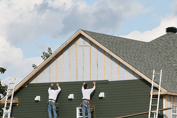 Professional Storm Damage Siding Repair technician working in Maytown, PA